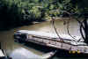large_canoe_in_rio_yuturi_at_lodge_6hrs_from_anything.JPG (99603 bytes)